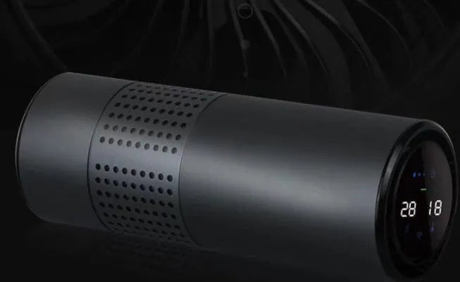 Aluminium alloy car air purifier with display screen and USB cable for 7-seat vehicles.