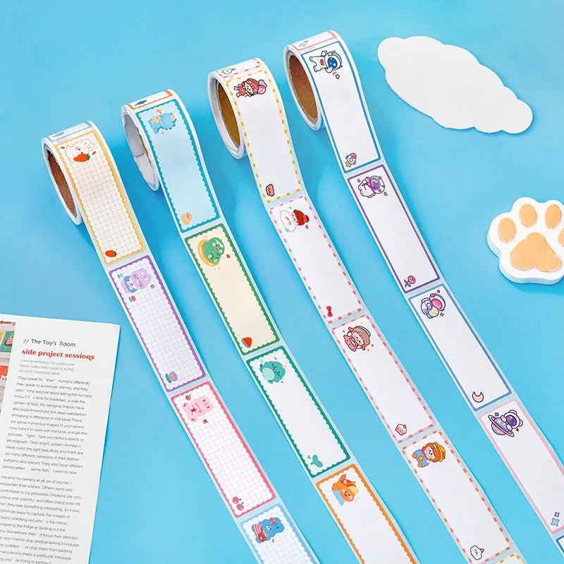 Roll of cartoon-themed adhesive name tape stickers showing dinosaur, astronaut, rabbit, and girl designs.
