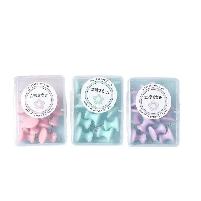 Boxed plastic push pins in macaron colours: cherry blossom pink, mint green, and lavender in large and small sizes