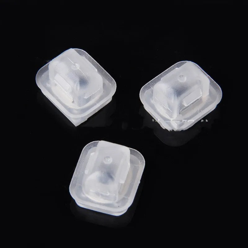 Transparent plastic interior fastener clip for BMW E39 and E38 models showing peach wood design.