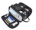 Black and brown men's Pu leather toiletry bag with zipped compartments open.