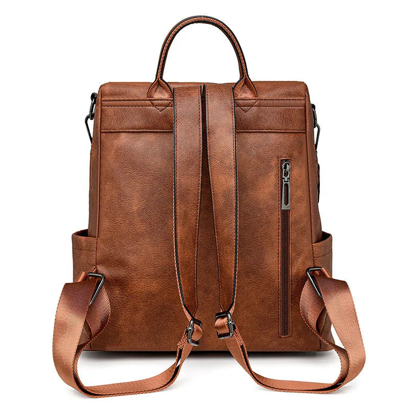 Retro women's backpack with two-tone fringe, soft PU outer, multiple compartments, available in various colours.