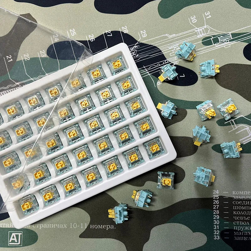 Pack of 36 Sea Salt Lemon PRO Mute tactile keyboard switch bodies for mechanical keyboard modding.