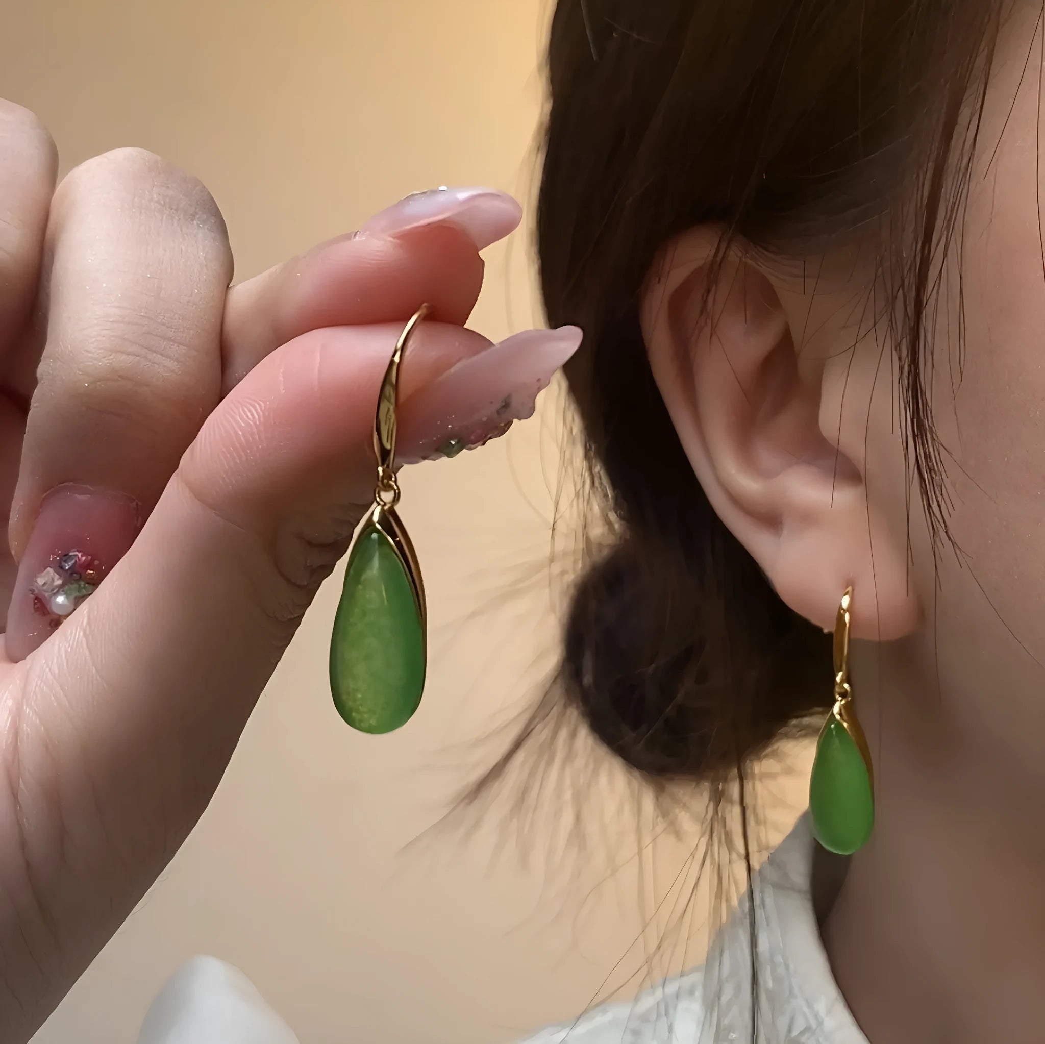 Chinese style geometric copper earrings with water droplet design in jade colour