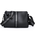 Black genuine leather women's crossbody bag showing front view and adjustable strap