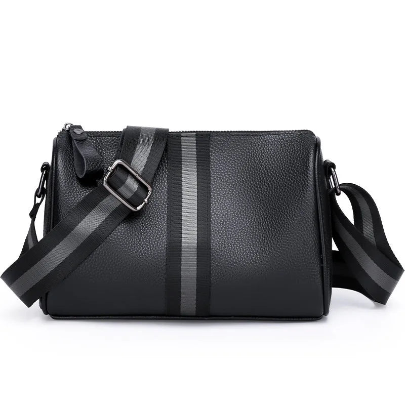 Black genuine leather women's crossbody bag showing front view and adjustable strap