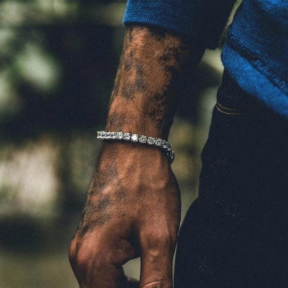 Men's silver alloy chain link bracelet with a single row of sparkling clear rhinestones.
