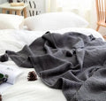 Acrylic fringed knit ball blanket in 130×170cm size showing plain pattern and fringe detail