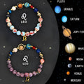 Natural stone beaded bracelets showing zodiac signs, set of two bracelets on display