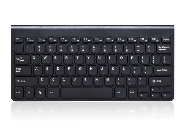 Black wireless keyboard and mouse set with 4G connectivity on desk