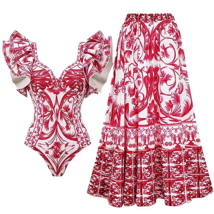 Women's printed one-piece polyester swimsuit in a red apron set design on a hanger.