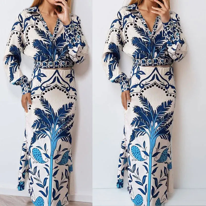 Women's floral print casual co-ord set with long sleeve top and long skirt on a hanger.