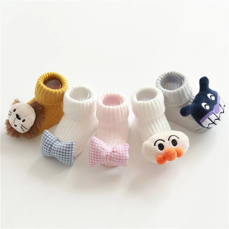Cotton baby floor socks in multiple designs including animal prints and bows for infants 0-3 months