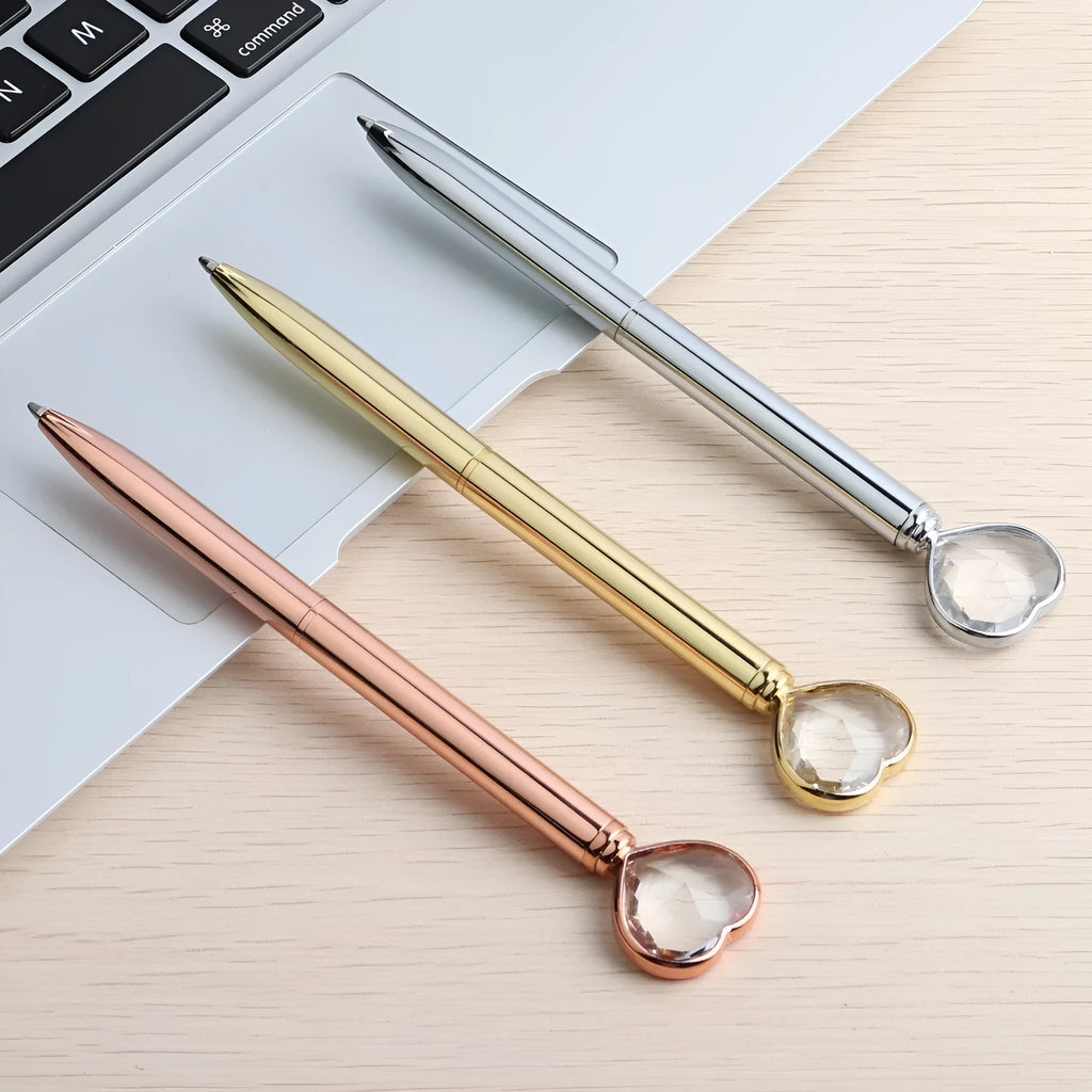 Creative Crystal Love Ball diamond metal pen in rose gold on a white background
