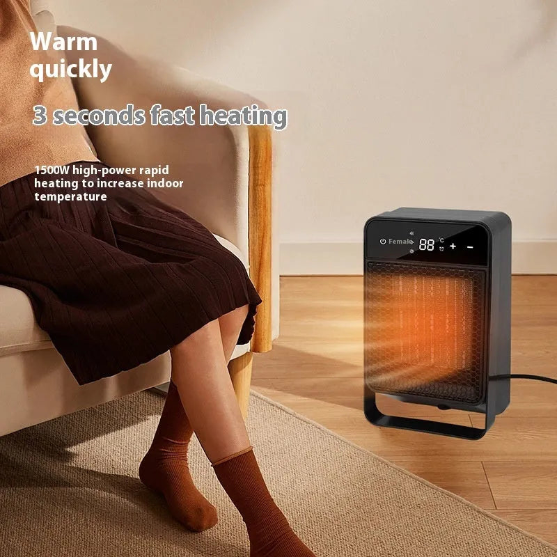 Black desktop warm air blower heater with a digital touch screen display and remote control on a wooden desk.