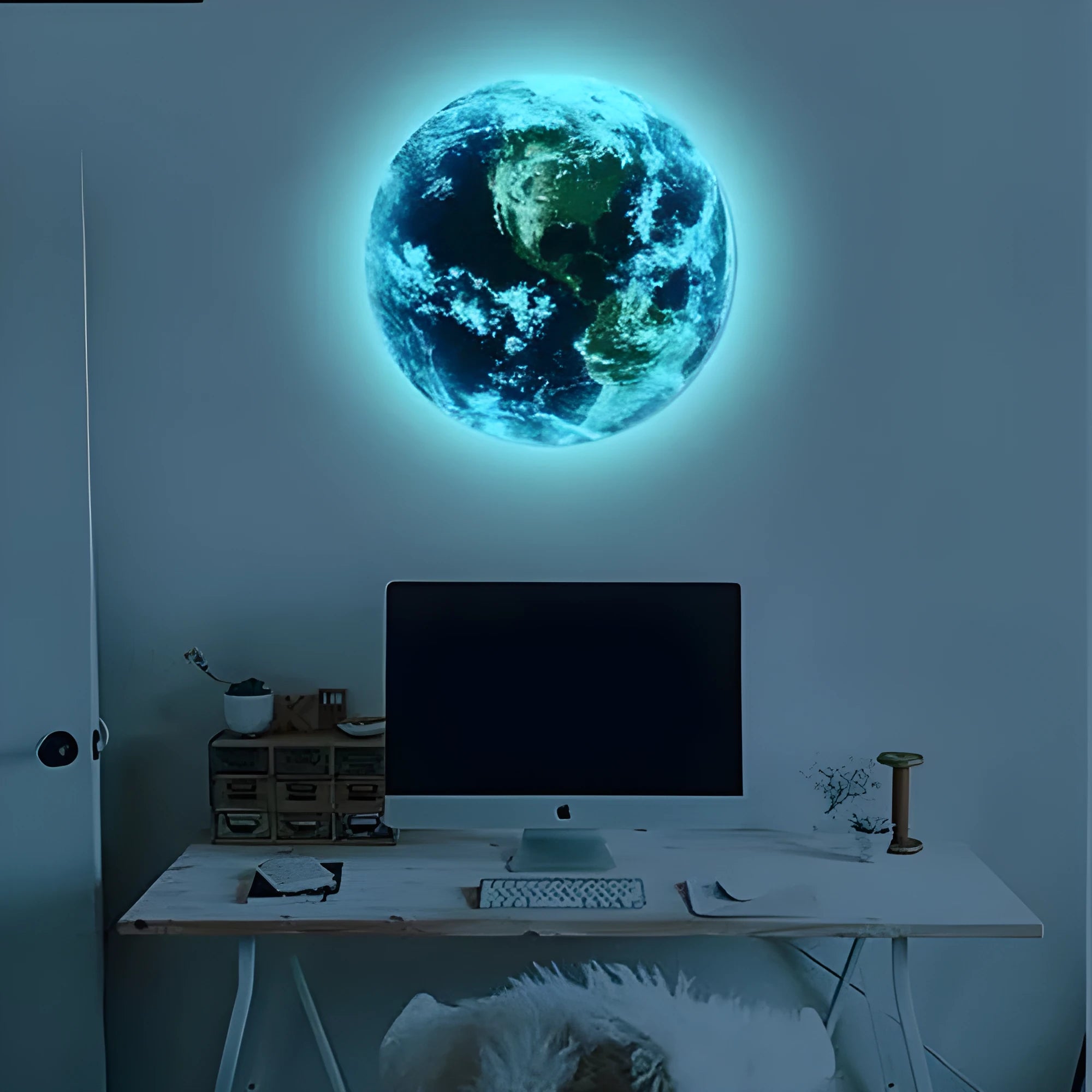 Glow in the dark 3D Earth planet wall sticker in various sizes on a dark background