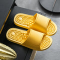Pair of non-slip PVC massage slippers with breathable upper and wear-resistant injection-moulded sole, available in seven colours.