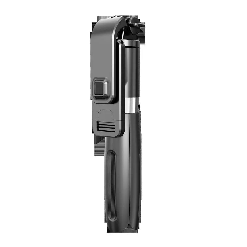 Black Bluetooth selfie stick with tripod legs extended and wireless remote, shown next to a smartphone.