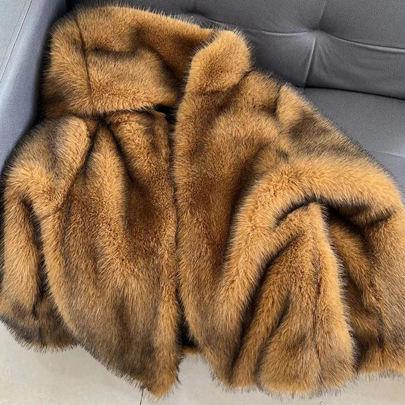 Women's artificial fur mid-length coat in silver grey with loose trendy style and regular sleeves.