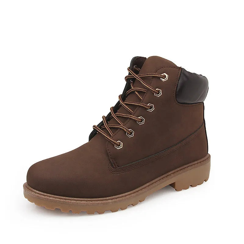 Pink men's high-top Martin boots with front laces and a round toe, showing the velvet lining.