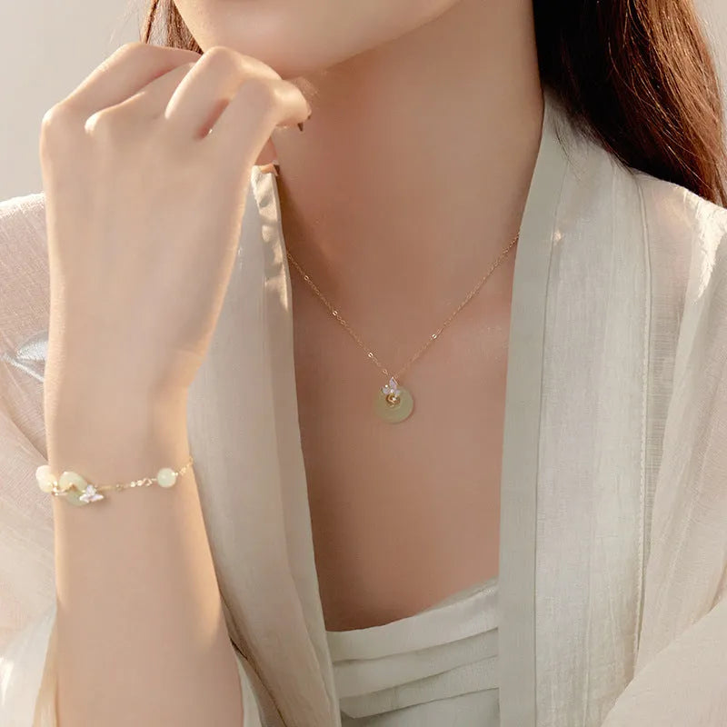 925 silver orchid pendant necklace with a peace buckle fastening on an O-ring chain.