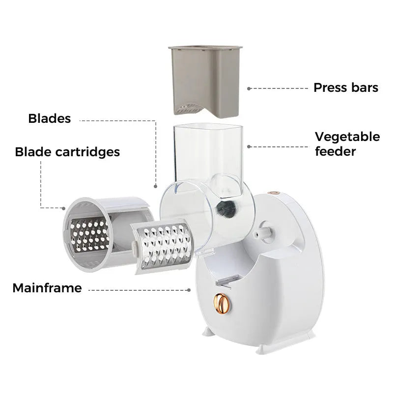 White electric vegetable slicer with suction base and multiple blades on a kitchen counter.