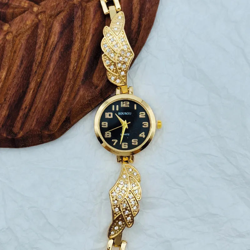 Slim stainless steel women's watch with round dial, shown in gold, black and gold, and white and gold colour variations.