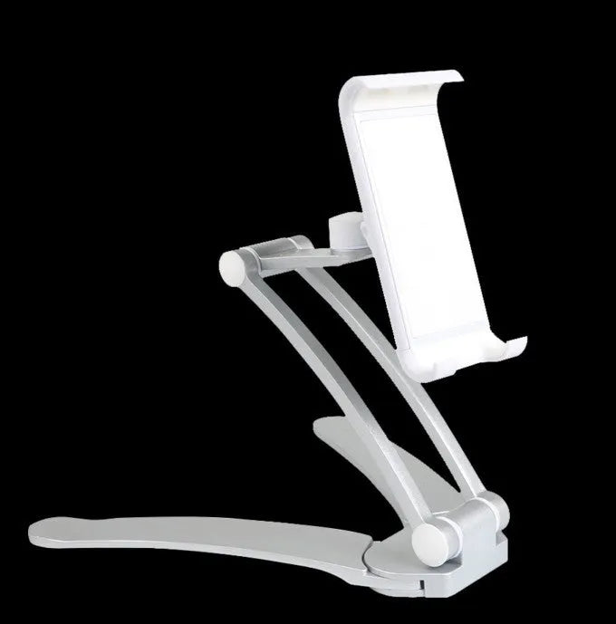 Silver aluminum alloy desktop stand holding a tablet at an angle, showing its adjustable clip and 360-degree rotation base.