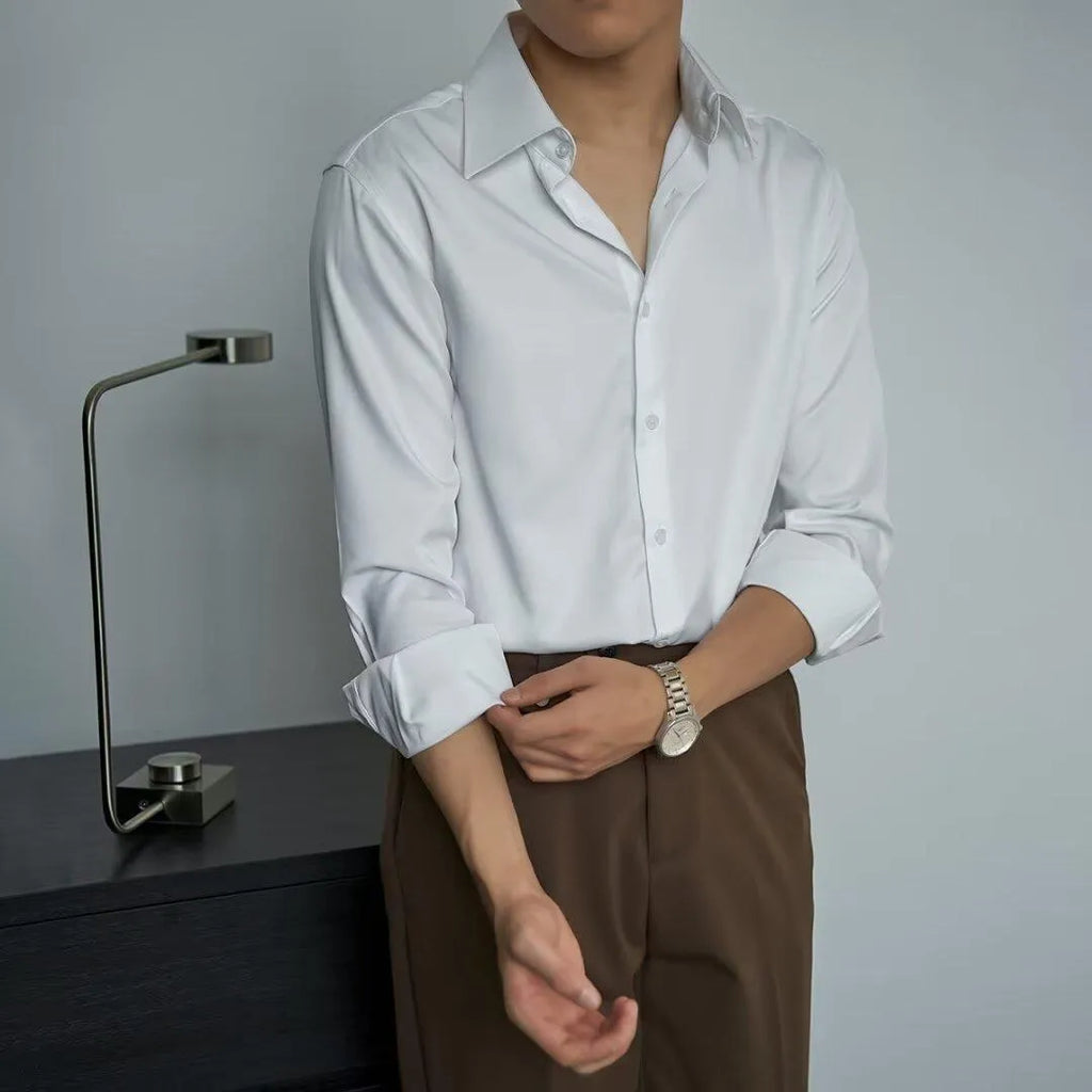 Men's black loose fit long sleeve cardigan shirt in Korean Japanese retro style on a hanger.