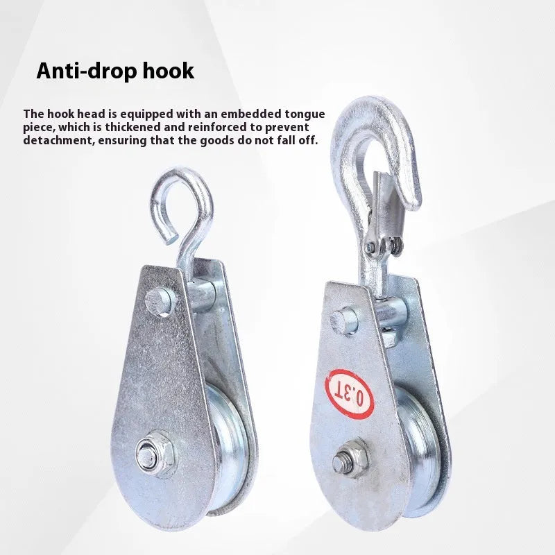 Small red industrial lifting pulley with a steel hook and safety latch for wire rope.