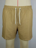 Men's navy blue and grey striped polyester beach shorts with a straight leg cut, laid flat.