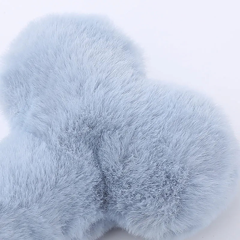 Blue love bone shaped plush dog toy with squeaker for interactive biting and chewing play