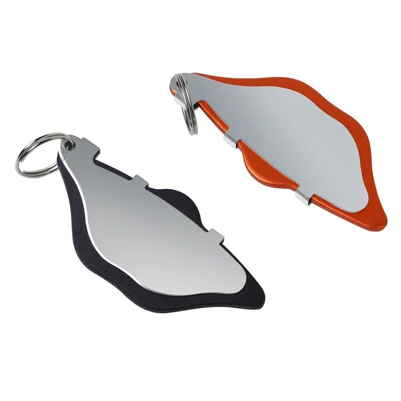 Black and orange mountain bike brake pads with scratch-proof metal linings and adjustment flap