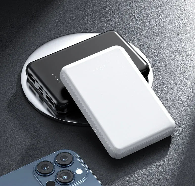 Black and white universal power bank for electric heating vests, showing compact size