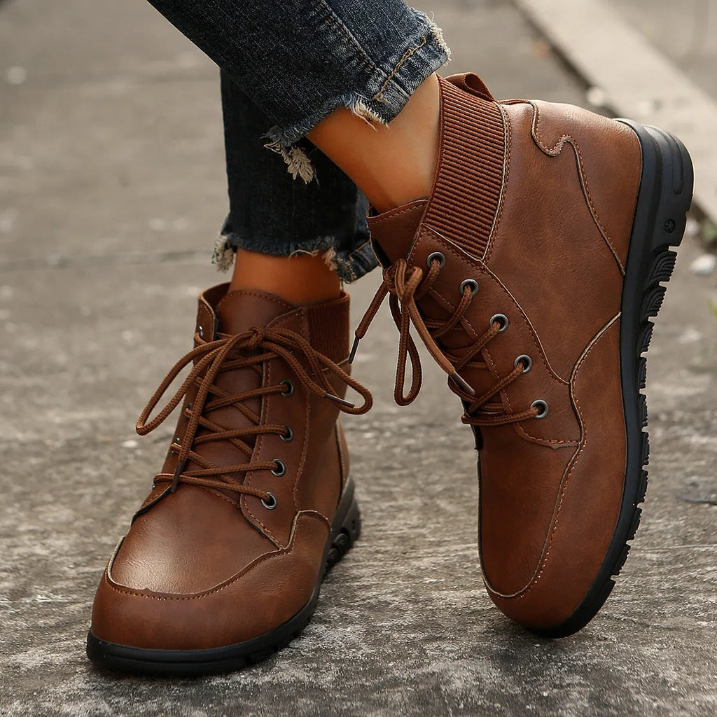 Round toe lace-up ankle boots for women in brown colour with flat non-slip sole and front strap retro western cowboy style