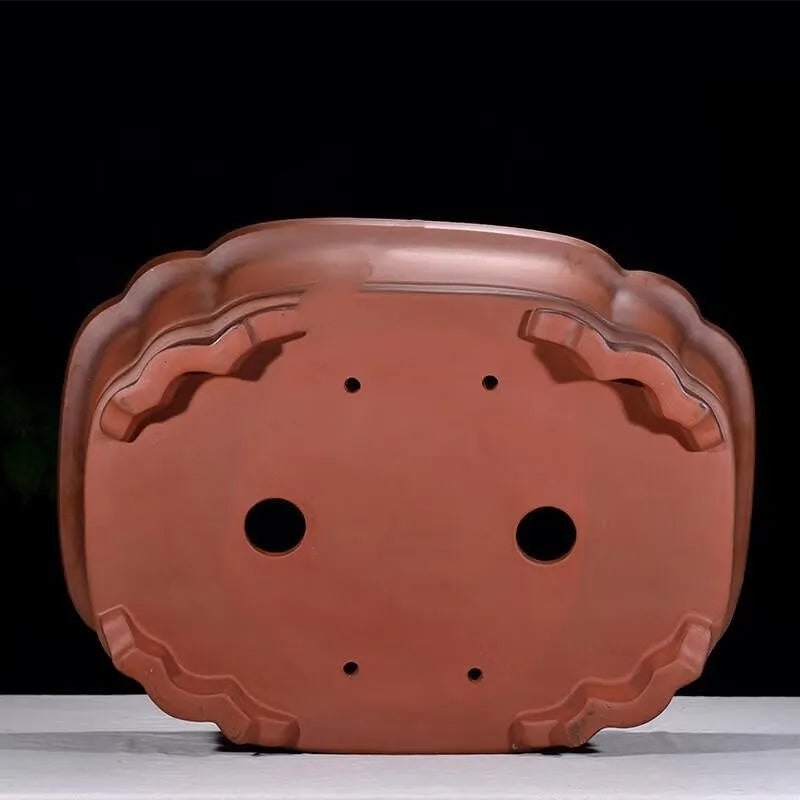 Large antique-finish purple clay Chinese style garden flower pot showing its size and deep planting cavity.