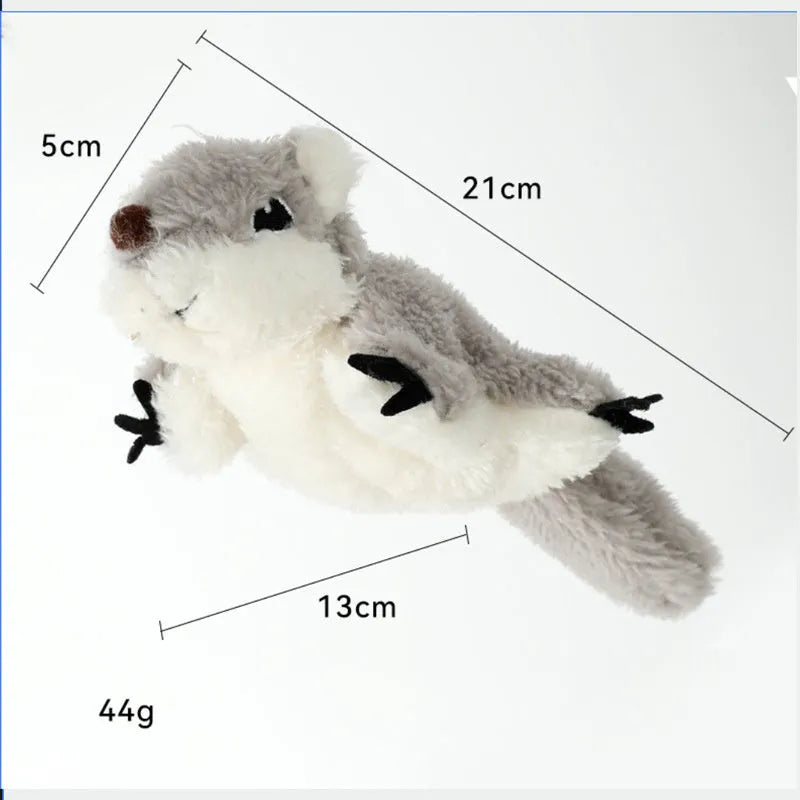 Grey flapping squirrel cat toy with USB charging cable on a plain background