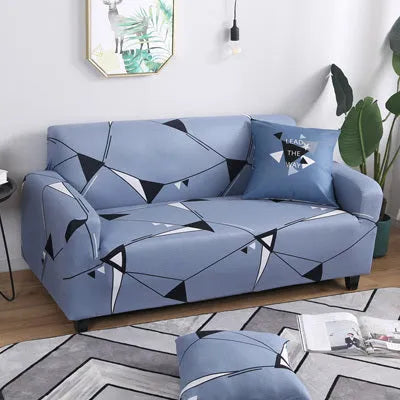 Geometric patterned stretch sofa slipcover on a double seat sofa with matching cushion
