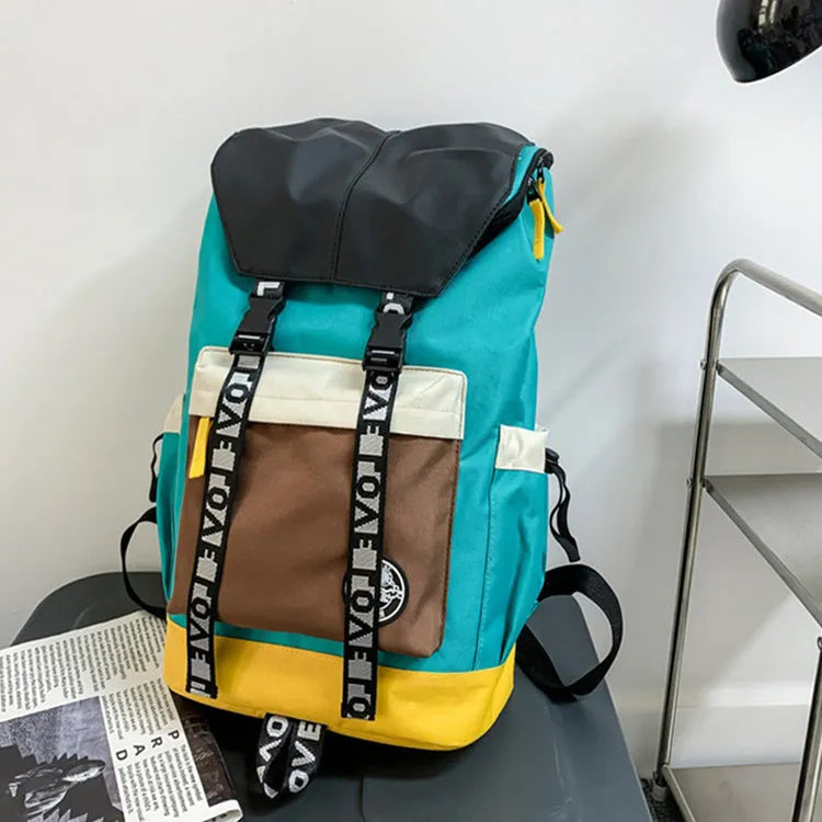 Oxford cloth school backpack in black, green, or red colour options.