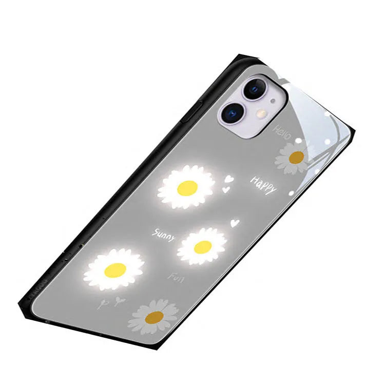 Luminous daisy design iPhone case with voice-activated colour light on an Apple iPhone