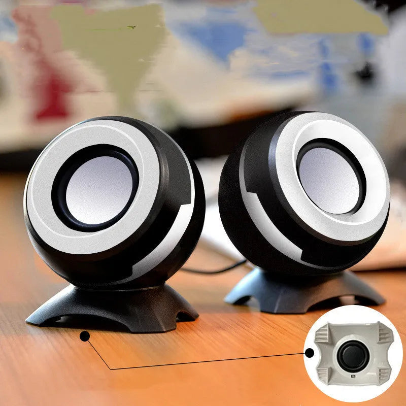 Compact black and gold USB-powered stereo desktop speakers for computers