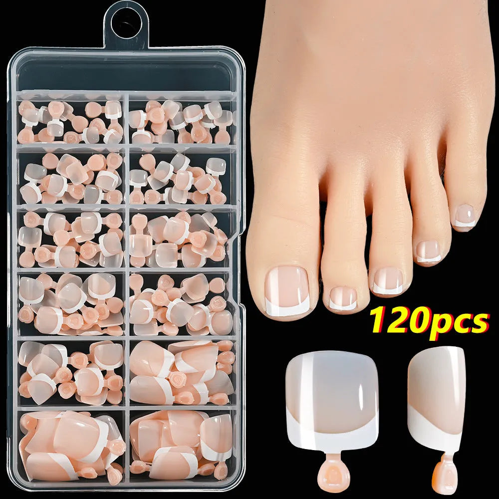 120-piece box of French white tip full square short nude nail appliqués in nine colour shades.