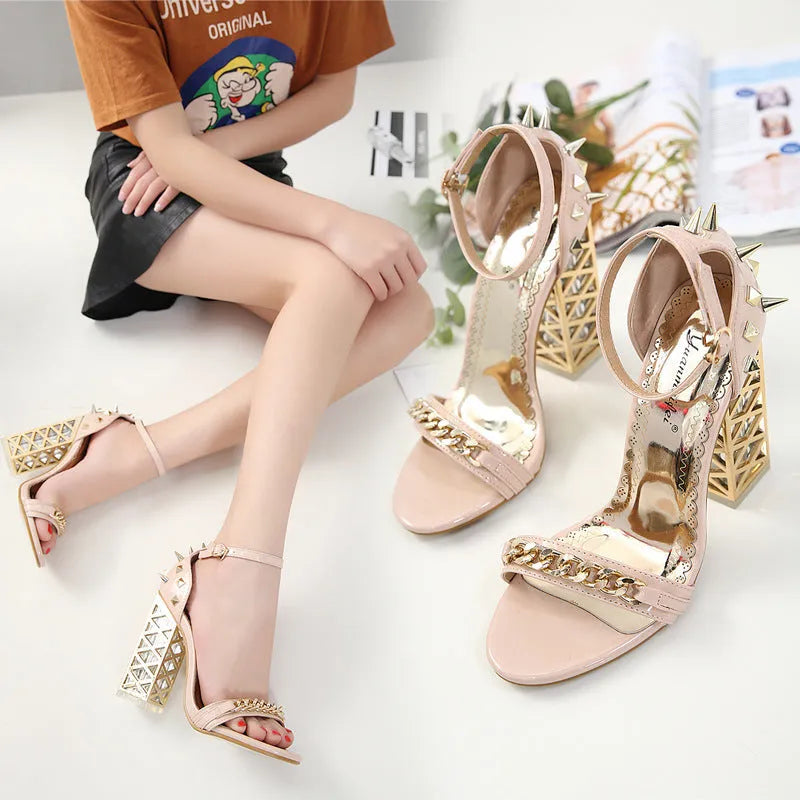 Women's black suede toe chain sandals with buckle fastening and TPR sole on neutral background
