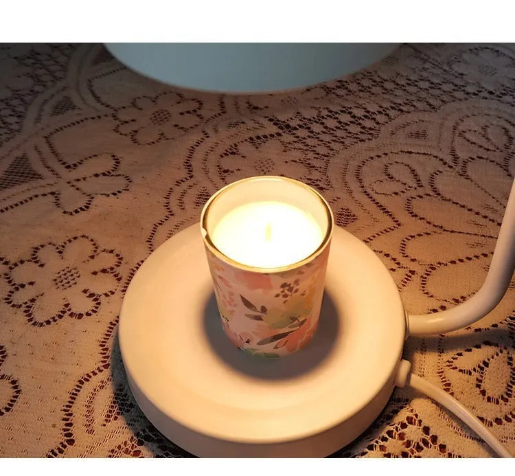 White European-style metal aromatherapy melting wax lamp with a dimmer switch on a 1.5 metre cord.