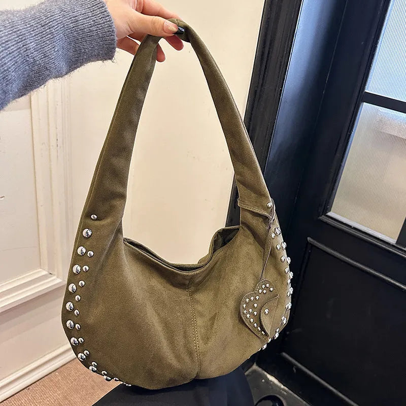 Soft plush women's retro tote handbag in strapless design showing colour options.