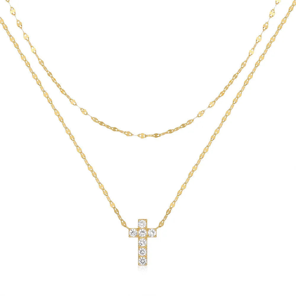 Sterling silver double layer cross pendant with twin diamonds on a clavicle chain.