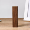 Brown walnut wood portable power bank with 2000mAh capacity and gift box packaging.