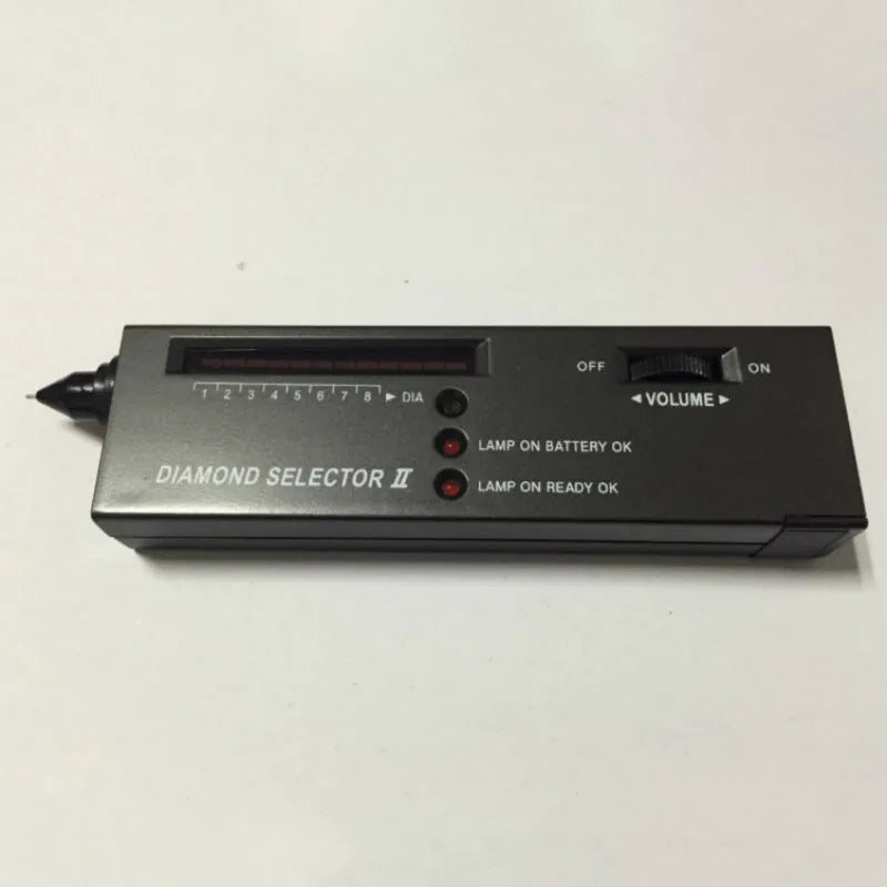 Second generation black diamond thermal conductivity tester with metal probe for gem identification.