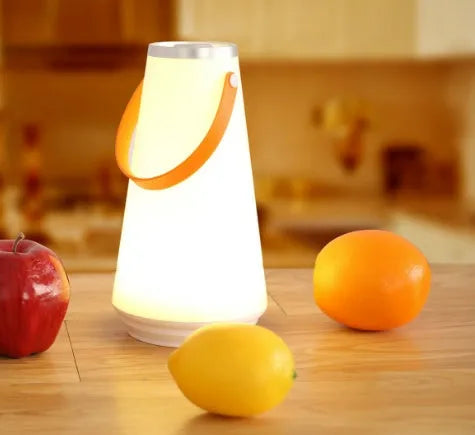 White rechargeable LED table lamp with square base and warm light illumination