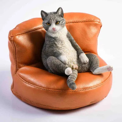 Lazy cat resin car ornament on sofa, approximately 75mm high dashboard decoration